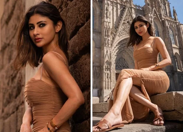 Mouni Roy turns heads in Spain, flaunting a ruched tan bodycon dress and sharing scenic snaps with the iconic Barcelona Cathedral