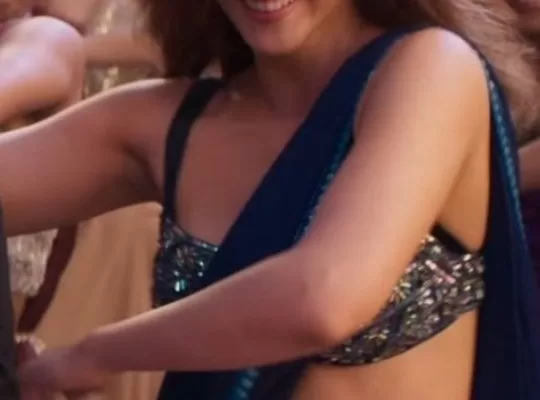 casually redefining hotness in this blue saree...